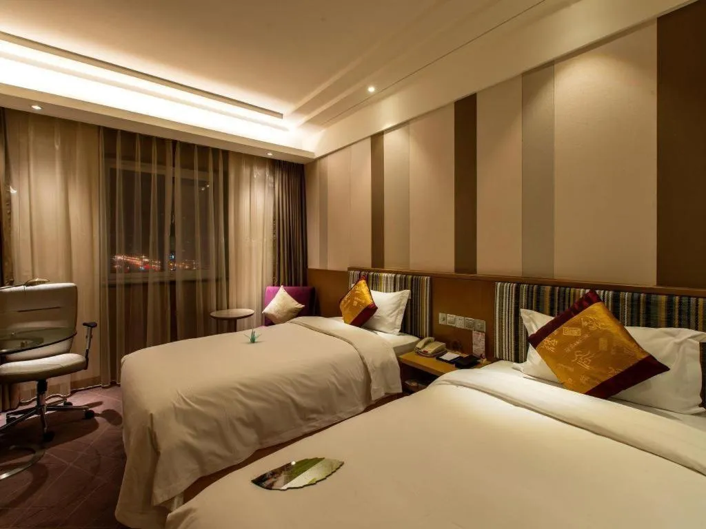 Bed in Grand Skylight Catic Hotel