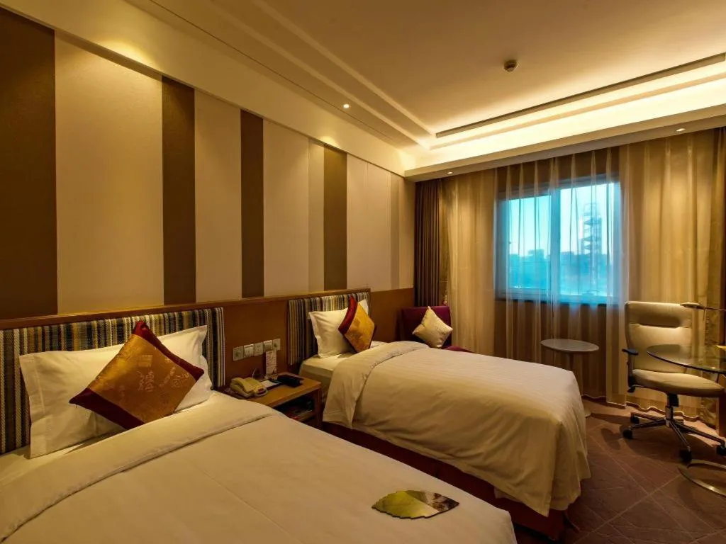 Bed in Grand Skylight Catic Hotel