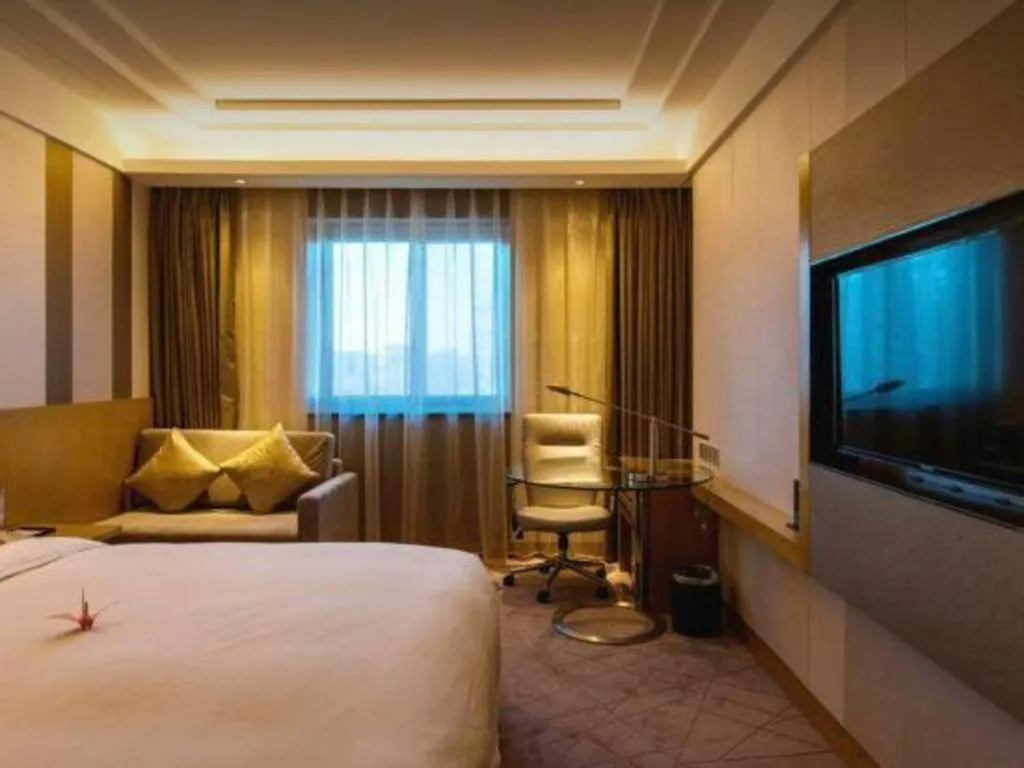 Bed in Grand Skylight Catic Hotel