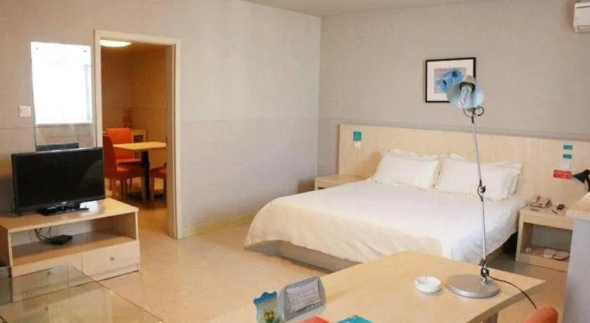 Bed in Jinjiang Inn Jiaxing South Lake