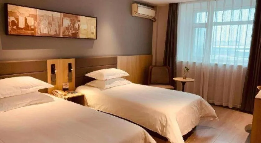 Bed in Jinjiang Inn Jiaxing South Lake