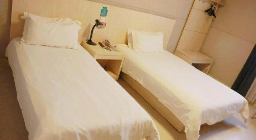 Bed in Jinjiang Inn Jiaxing South Lake