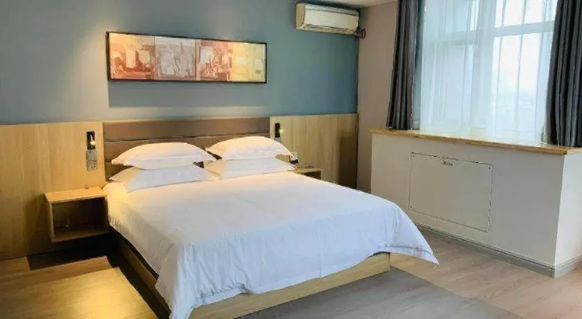 Bed in Jinjiang Inn Jiaxing South Lake