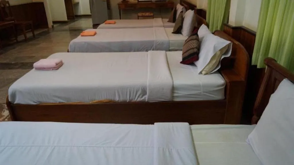 Bed in Champa Residence Hotel