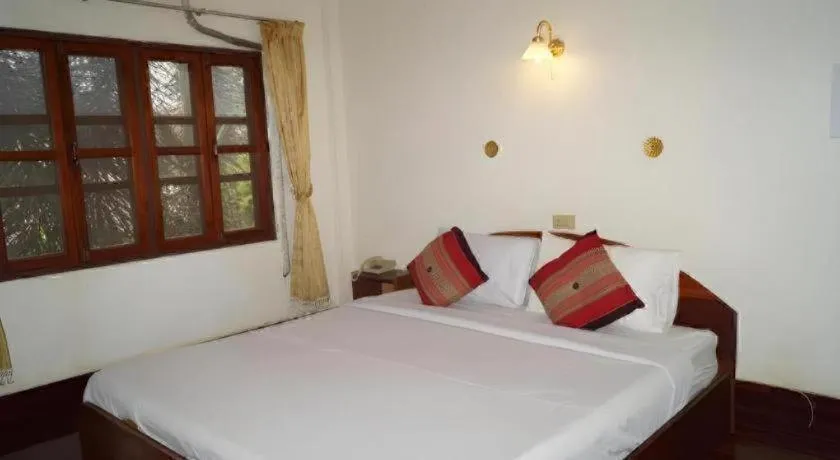 Bed in Champa Residence Hotel