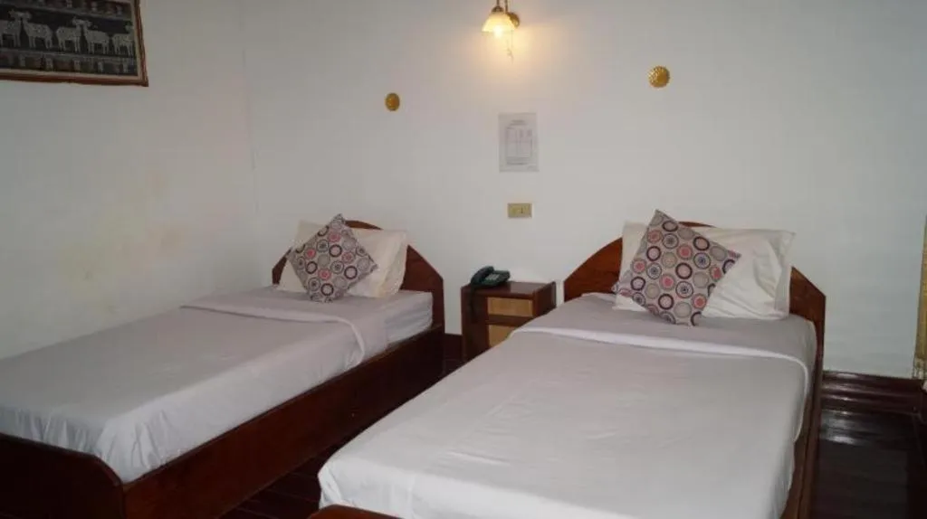 Bed in Champa Residence Hotel