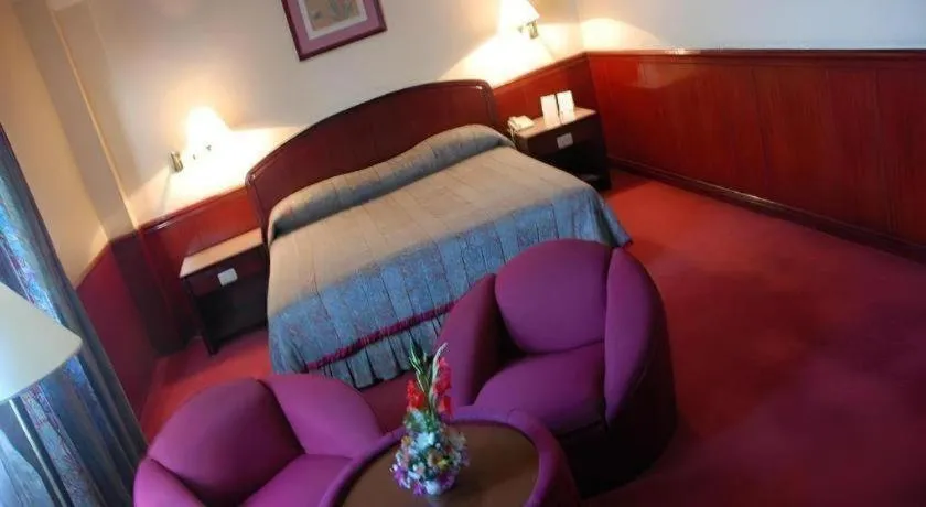 Bed in Great Eastern Hotel Quezon City