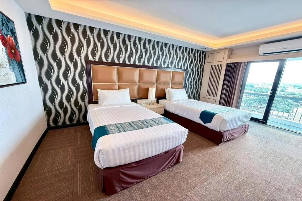 Bed in Pailyn Phitsanulok Hotel