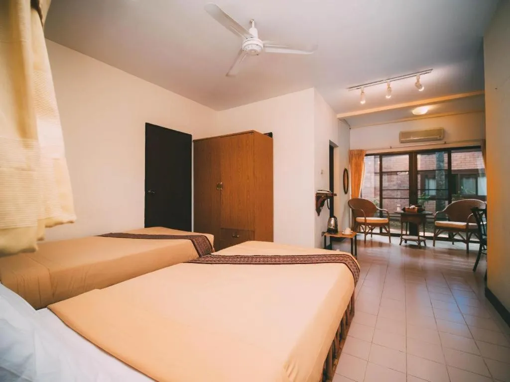 Bed in Tao Garden Health Spa & Resort