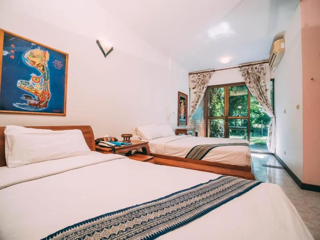 Bed in Tao Garden Health Spa & Resort