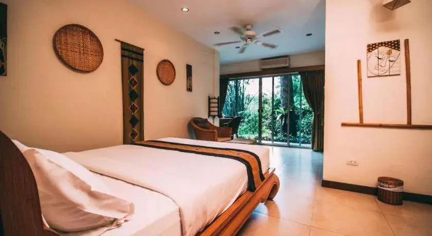 Bed in Tao Garden Health Spa & Resort Bed in Tao Garden Health Spa & Resort