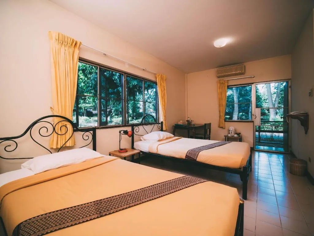 Bed in Tao Garden Health Spa & Resort