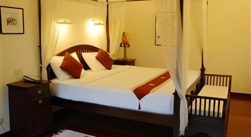 Bed in Tao Garden Health Spa & Resort