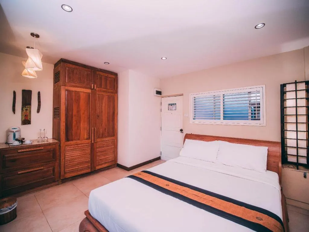 Bed in Tao Garden Health Spa & Resort