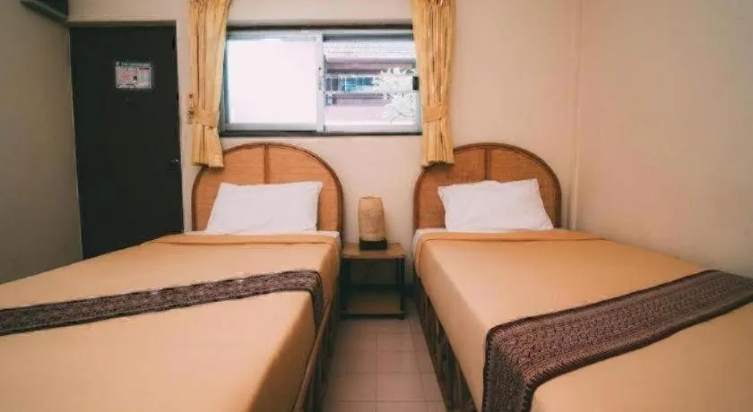 Bed in Tao Garden Health Spa & Resort