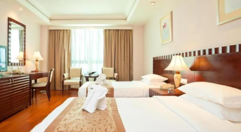 Bed in Sanya Baohong Hotel