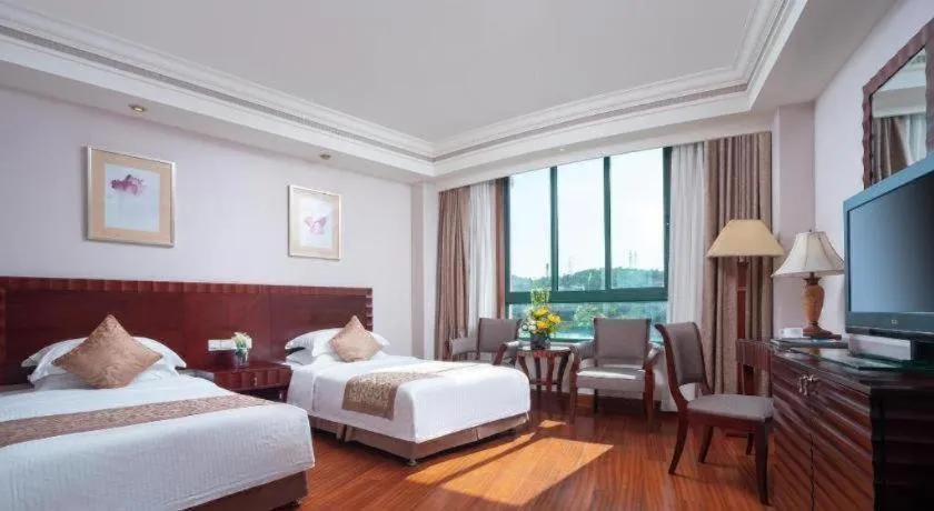 Bed in Sanya Baohong Hotel