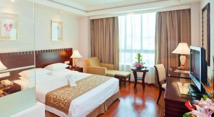 Bed in Sanya Baohong Hotel