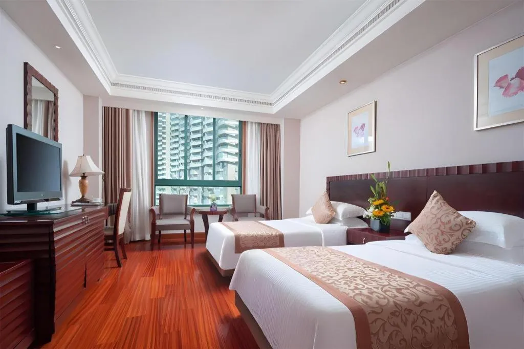 Bed in Sanya Baohong Hotel