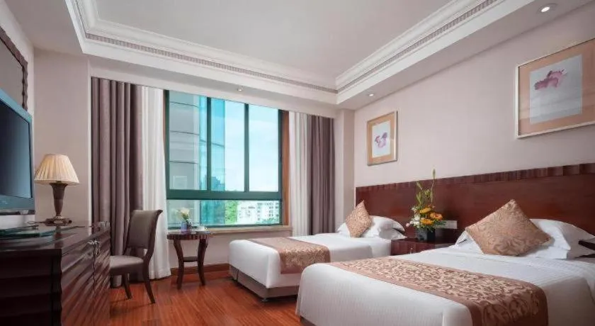 Bed in Sanya Baohong Hotel