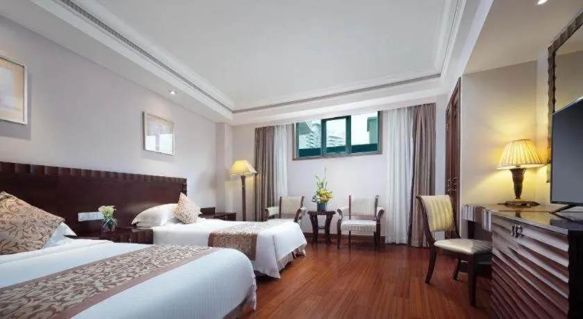 Bed in Sanya Baohong Hotel