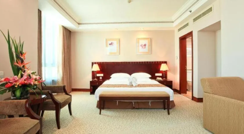 Bed in Sanya Baohong Hotel