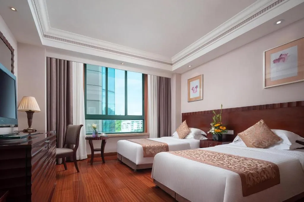 Bed in Sanya Baohong Hotel