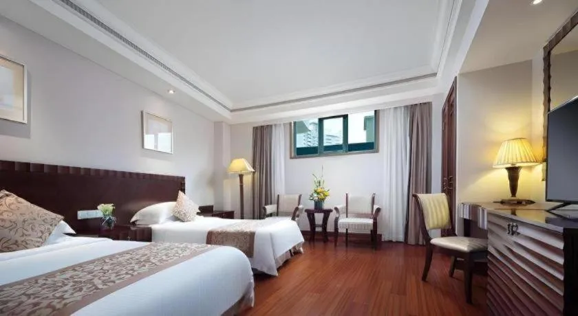 Bed in Sanya Baohong Hotel