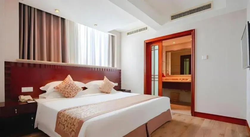 Bed in Sanya Baohong Hotel Bed in Sanya Baohong Hotel