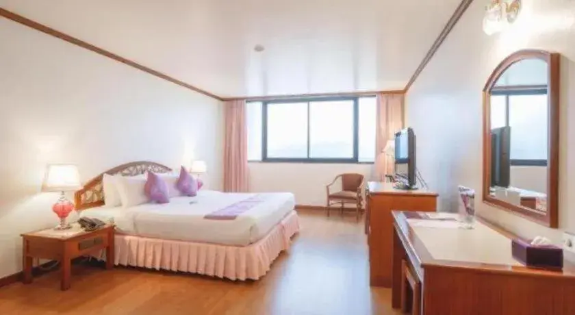 Bed in K.P. Grand Hotel Chanthaburi Bed in K.P. Grand Hotel Chanthaburi