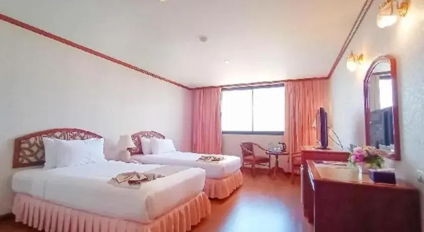 Bed in K.P. Grand Hotel Chanthaburi Bed in K.P. Grand Hotel Chanthaburi