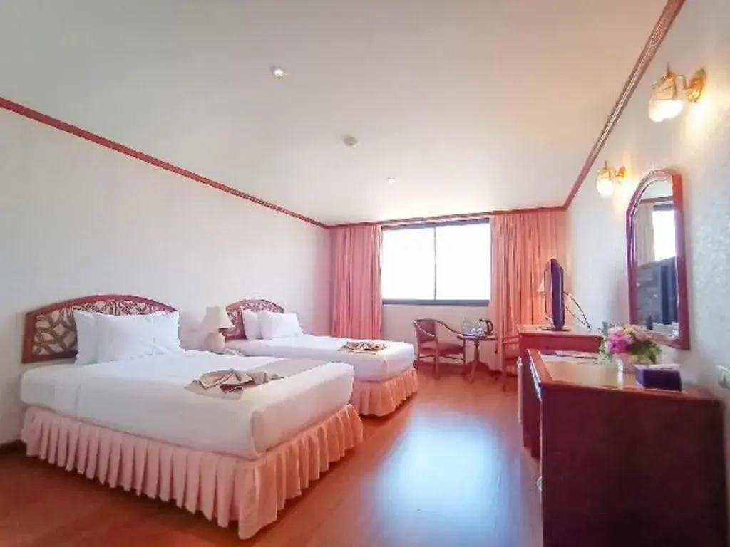 Bed in K.P. Grand Hotel Chanthaburi Bed in K.P. Grand Hotel Chanthaburi