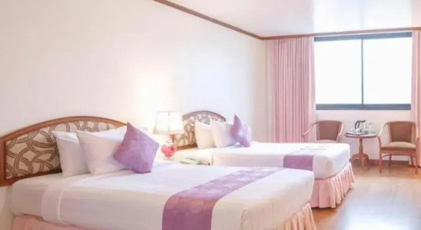 Bed in K.P. Grand Hotel Chanthaburi Bed in K.P. Grand Hotel Chanthaburi