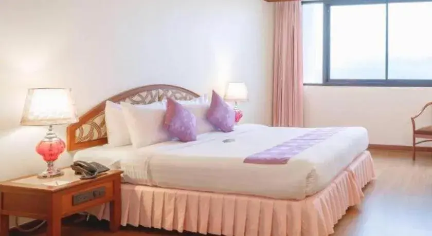 Bed in K.P. Grand Hotel Chanthaburi Bed in K.P. Grand Hotel Chanthaburi
