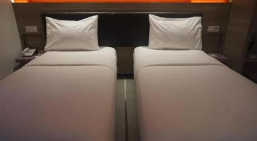 Bed in Amaris Hotel Ambon