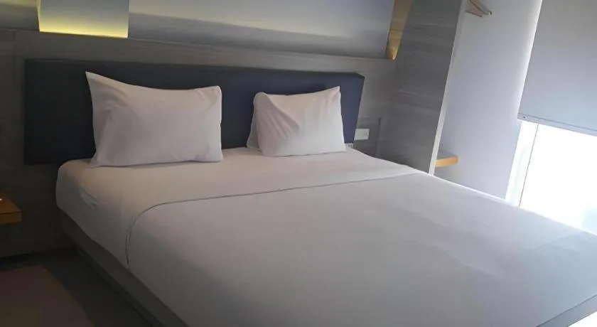 Bed in Amaris Hotel Ambon