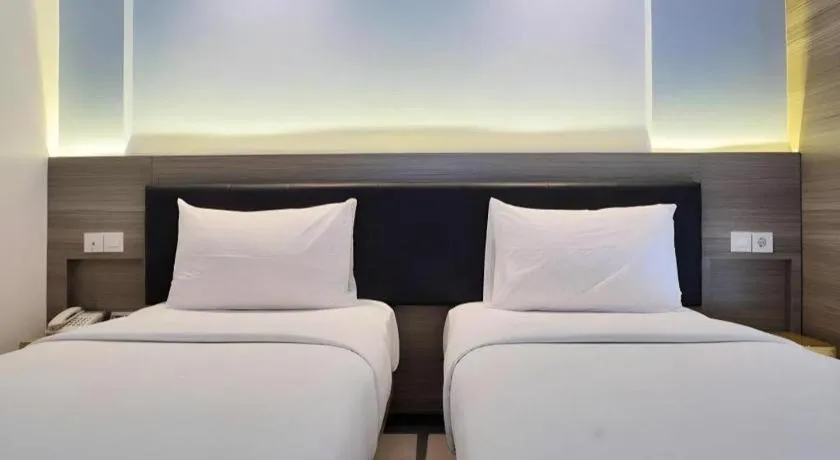 Bed in Amaris Hotel Ambon