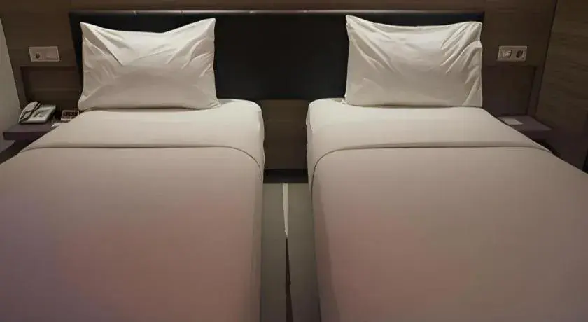 Bed in Amaris Hotel Ambon Bed in Amaris Hotel Ambon