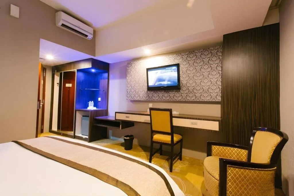 Bed in Hermes Palace Hotel Medan