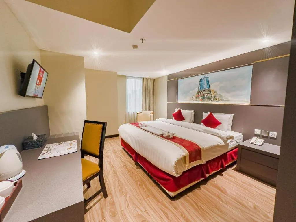 Bed in Hermes Palace Hotel Medan