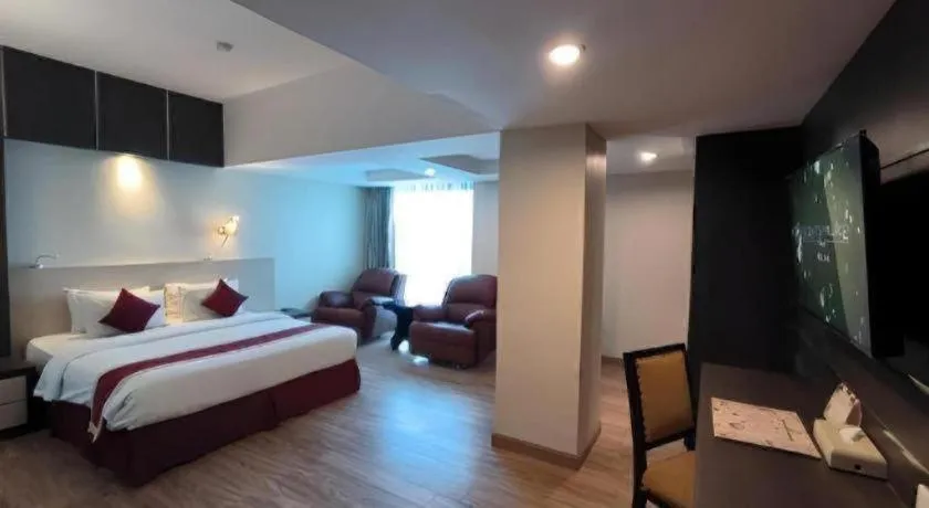 Bed in Hermes Palace Hotel Medan