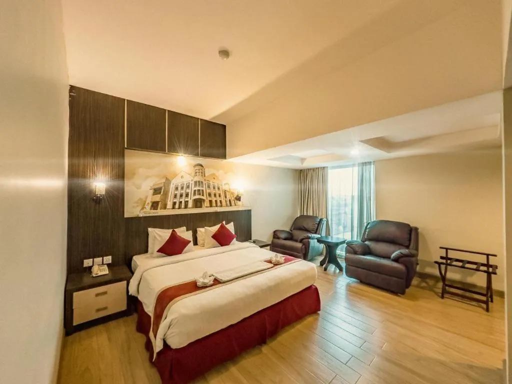 Bed in Hermes Palace Hotel Medan