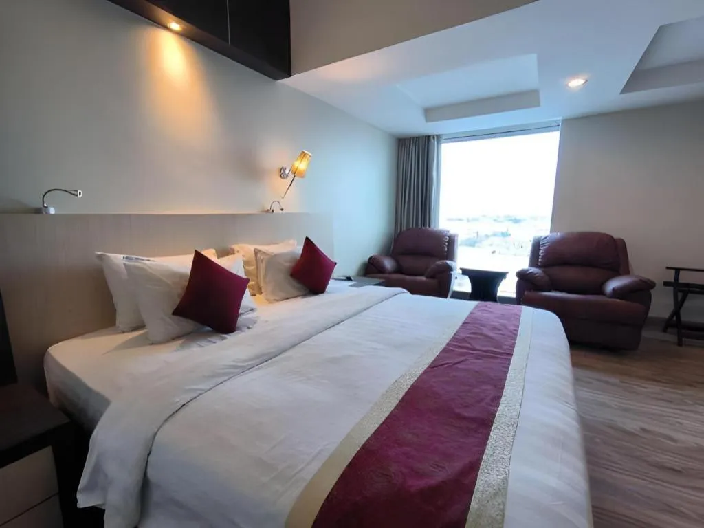 Bed in Hermes Palace Hotel Medan