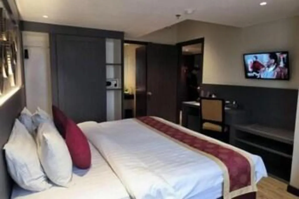 Bed in Hermes Palace Hotel Medan