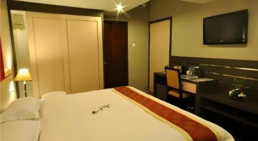 Bed in Hermes Palace Hotel Medan