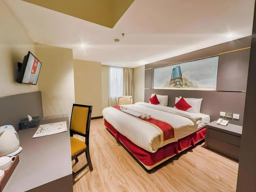 Bed in Hermes Palace Hotel Medan