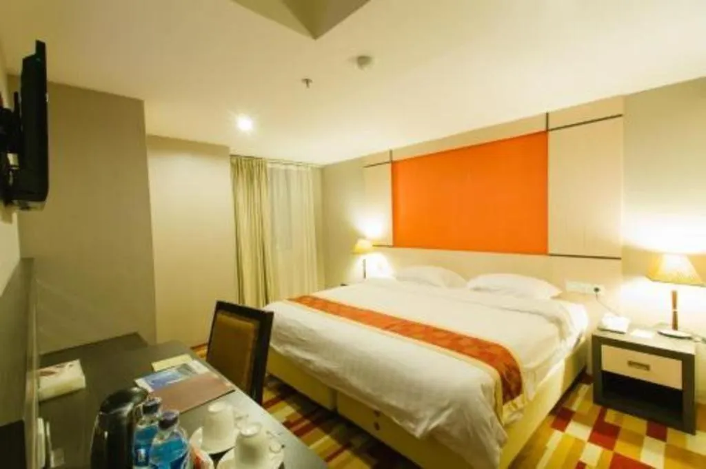 Bed in Hermes Palace Hotel Medan