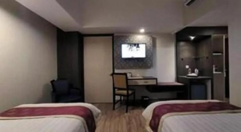 Bed in Hermes Palace Hotel Medan