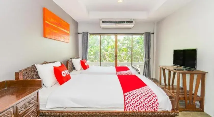 Bed in OYO 884 Baan Sang Chan Cha-am Bed in OYO 884 Baan Sang Chan Cha-am