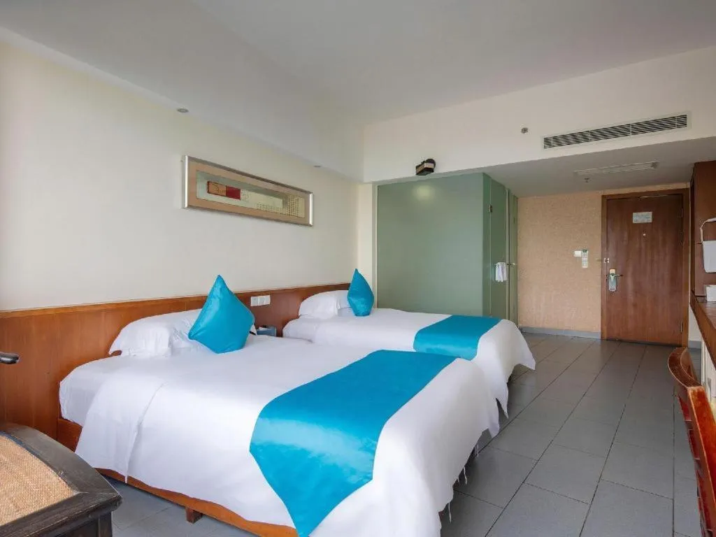 Bed in Sanya Luyi Sea View Hotel
